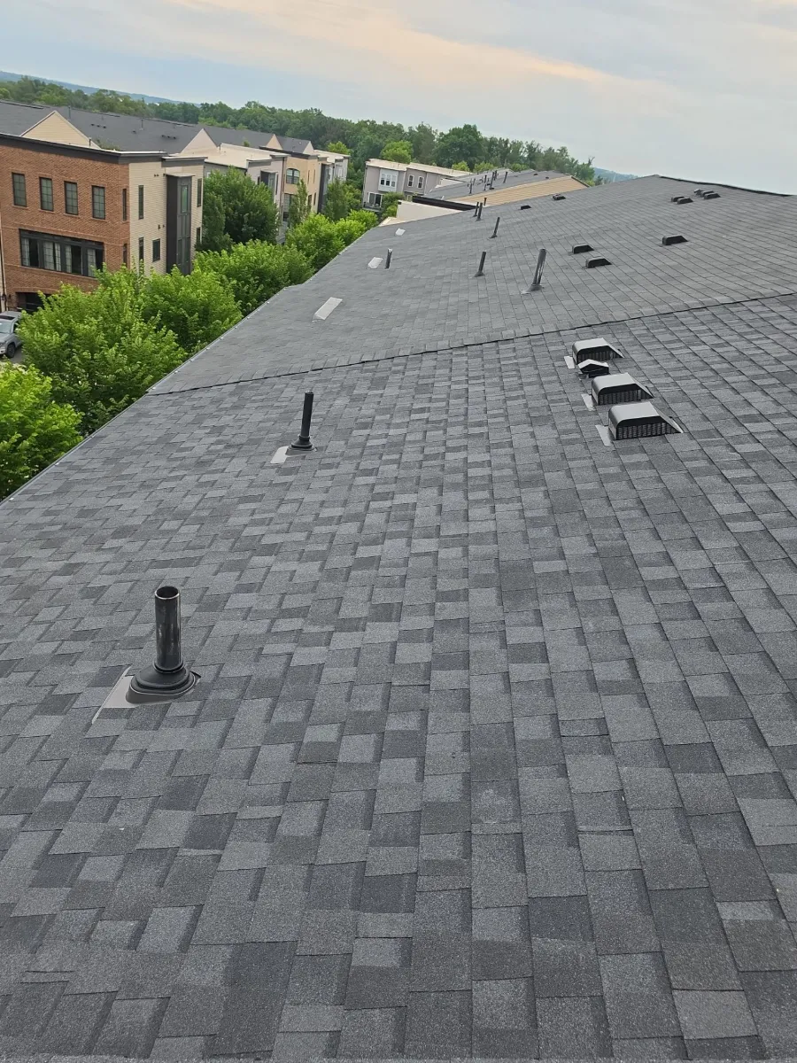 New roof vents and shingles on a finished roof in Brambleton, VA
