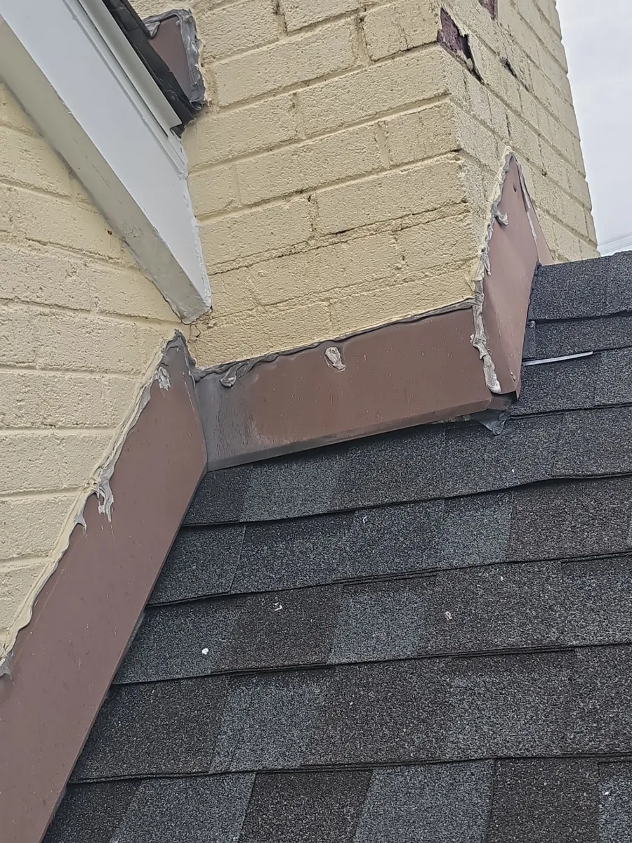 Chimney and roof flashing before replacement in Hamilton, VA