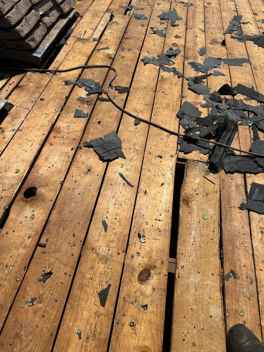 Roof decking being checked and repaired during replacement in Hamilton, VA