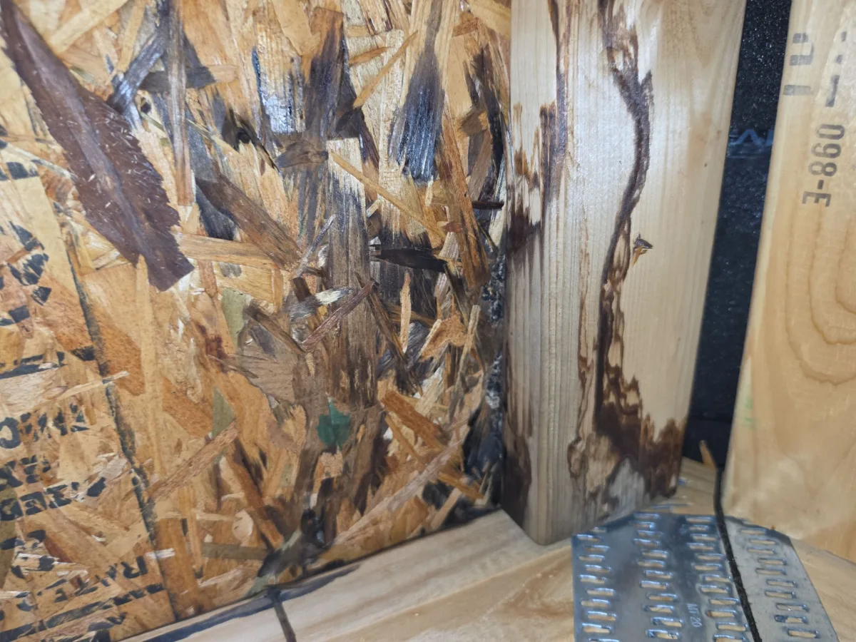 Water-stained roof decking seen from the attic of a Hamilton, VA home