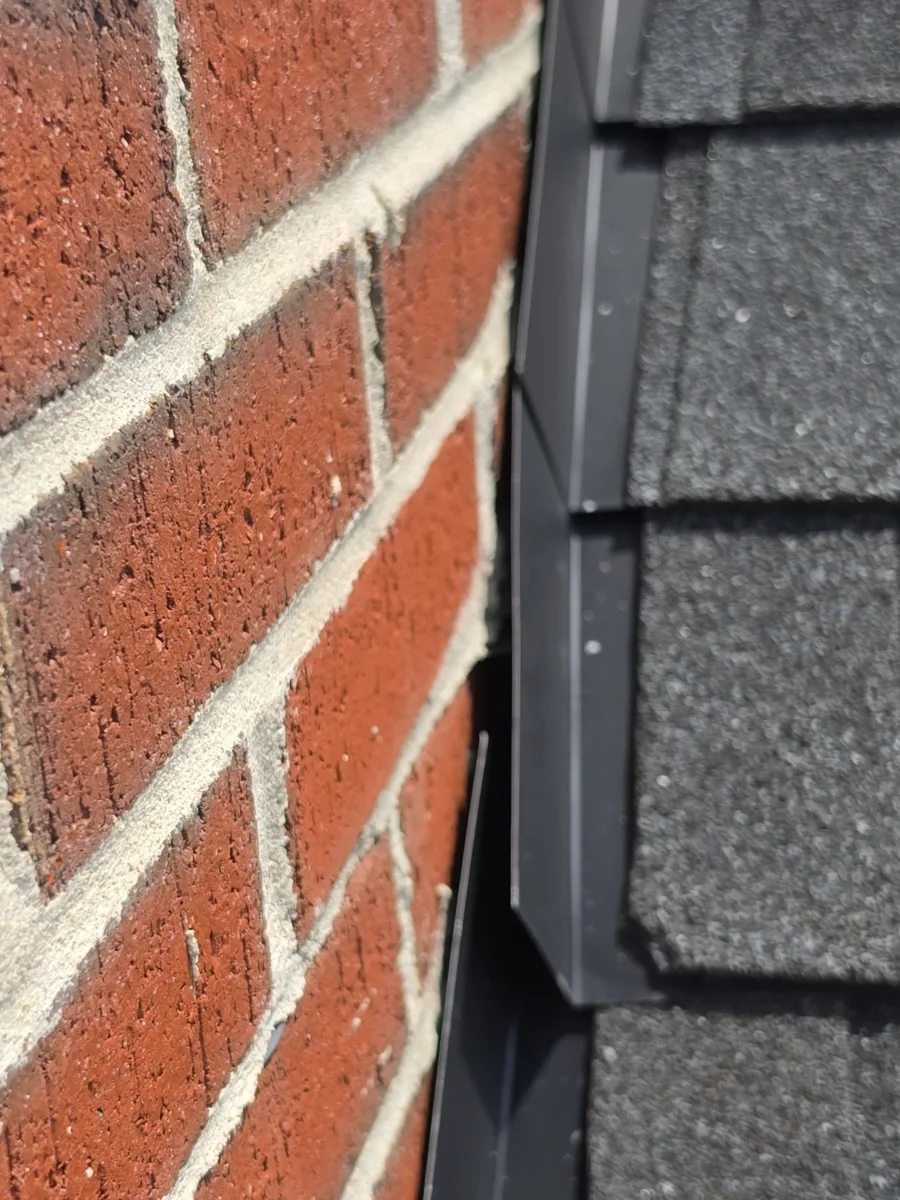 Roof meeting a brick wall with no counter flashing in Hamilton, VA