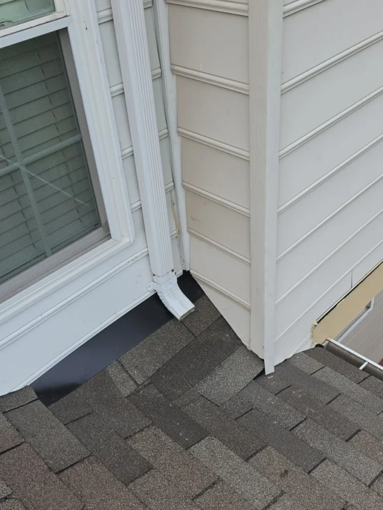 Finished roof-to-wall area after a leak repair in Leesburg, VA