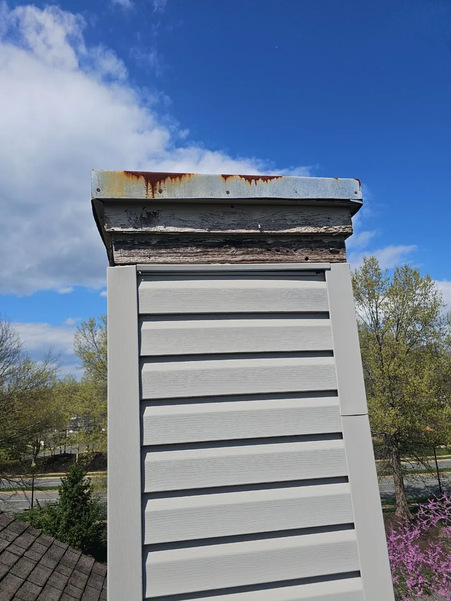 Chimney chase top before replacement on a Sterling, VA townhouse