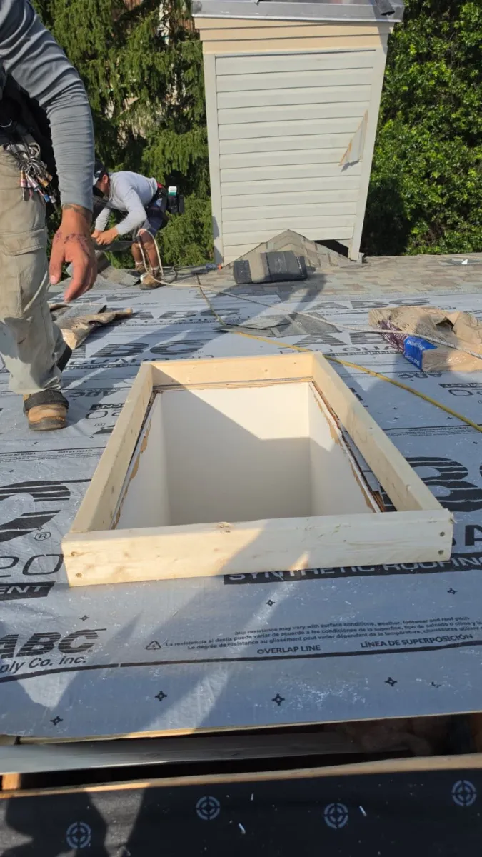 Roof opening framed and covered with underlayment during a Sterling, VA roof replacement